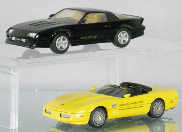 2 WESTERN MODEL CHEVROLETS: white metal, 1985 Camaro Z28 Iroc-Z, 1985 Corvette Indy Pace Car, both sideview mirrors loose & taped to the car bottom, C8.