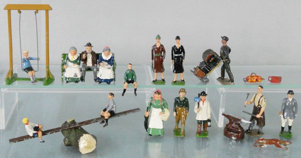 BRITAINS FARM & CIVILIAN LOT: 619 Garden Swing w/boy, 618 See Saw w/3 children, 589 Blacksmith w/anvil, 612 Huntsman, 616 Fox, Bench w/3 seated figures, Man w/luggage & luggage cart, 5 additional figures, C6-8.