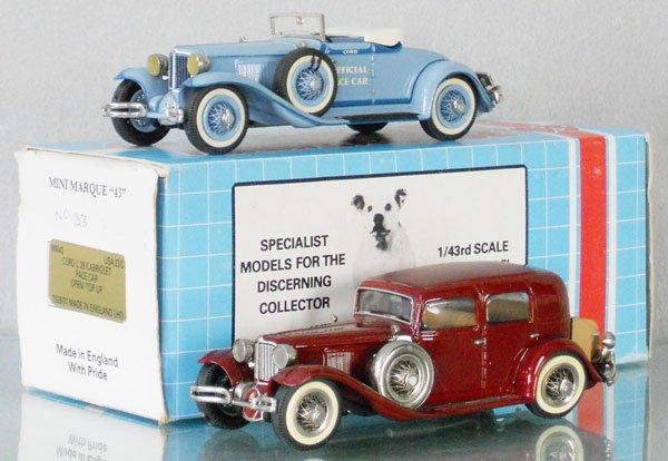 2 MINI MARQUE 43 CORD MODELS: white metal, 1929/31 Cord L29 Cabriolet Pace Car, orig box, 1929 Cord L29 Sedan, broken rear fender reglued, touch up paint on front fender, C7-9.