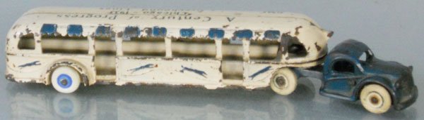 ARCADE CENTURY OF PROGRESS BUS: painted cast iron, 11 1/2” long, 2 tires replaced on trailer, A Century of Progress Chicago 1933 Greyhound Lines written on trailer top, C5-6.