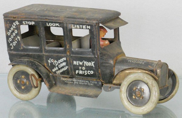STRAUSS LEAPIN’ LENA: litho tin, windup not working, missing 2 front fenders, 8” long, some surface oxidation, C4.