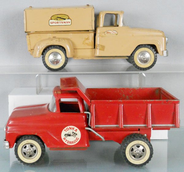 2 TONKA TRUCKS: painted pressed steel, #5 Sportsman, missing boat, scotch tape residue on sides, door decals incom, Hydraulic Dump, C5.