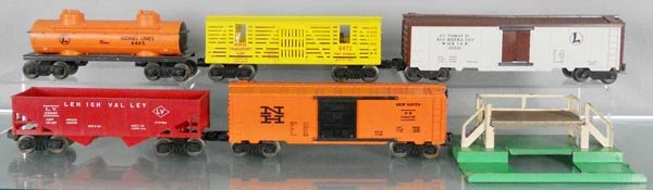 5 LIONEL FREIGHT CARS: O ga, 6465 tank, 6473 horse transport, 3662 milk car w/platform, 6476 hopper, 6464-725 New Haven box car, C5-7.