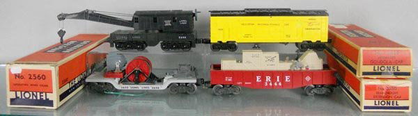4 LIONEL FREIGHT CARS: O ga, 2560 crane, 3619 helicopter reconnaissance car, w/orig red helicopter, 3650 searchlight generator car, w/crank, 3444 animated gondola, 3 orig boxes only, minor wear, 1 taped, C5-7.