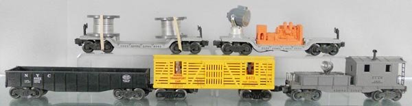 5 LIONEL FREIGHT CARS: O ga, 6561 flat w/cable reels, 3520 searchlight, 6462 gondola, 6473 horse transport, 2420 work caboose, C6-7.