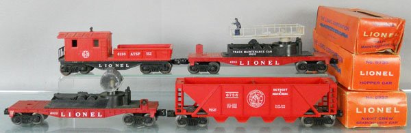 4 LIONEL FREIGHT CARS: O ga, 6130 work caboose, 6812 track maintenance car, 6822 searchlight car, missing man, 6736 hopper, 3 orig boxes only, boxes rough, C6-8.