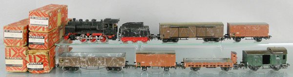 MARKLIN TRAIN SET: HO ga, RM800 loco & tender w/332 box car, 2 #312 box cars, 331 gondola, some surface corrosion, 323 flat car, 310 box car, 5 orig boxes only, 2 are incorrect to cars, C4-5.