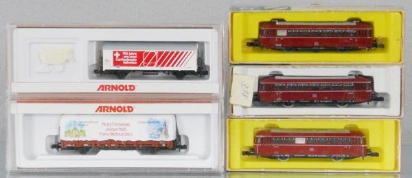ARNOLD RAPIDO TRAIN LOT: N ga, 4551, 4466 freight cars, 0291, 0392 & 0391 rail buses, orig boxes minor wear, C8-10.