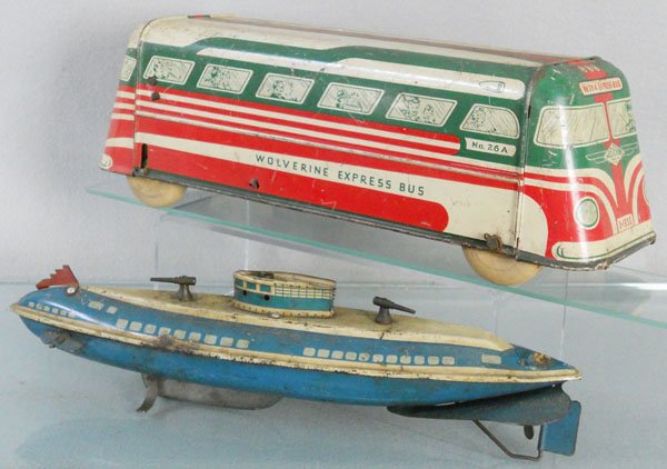 2 WOLVERINE TOYS: litho tin, Express Bus, 14” long, friction working, front axle replaced, Submarine, windup working, 12 1/2” long, C4-5.