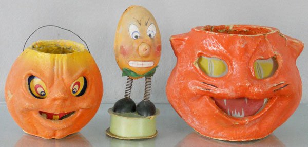 3 HALLOWEEN DECORATIONS: Pumpkin, pressed cardboard, 4” tall, Pumpkin Candy Box, 6” tall, some wear, Cat, pressed cardboard, 5” tall, missing wire holder, C4-5.
