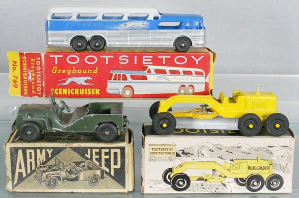 3 TOOTSIETOY VEHICLES: 769 Greyhound Bus, closed-chassis version, Army Jeep, 3710 Grader, orig boxes minor wear, C8-9.