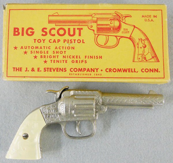 J&E STEVENS BIG SCOUT CAP GUN: nickelplated cast iron, 7” long, working, orig box minor wear, C8.