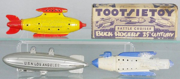 3 TOOTSIETOY SPACE SHIPS: 1032 Buck Rogers Venus Destroyer, 1030 Los Angeles Zeppelin, 1031 Buck Rogers Battle Cruiser, some surface oxidation, w/orig box, minor wear, C4-6.