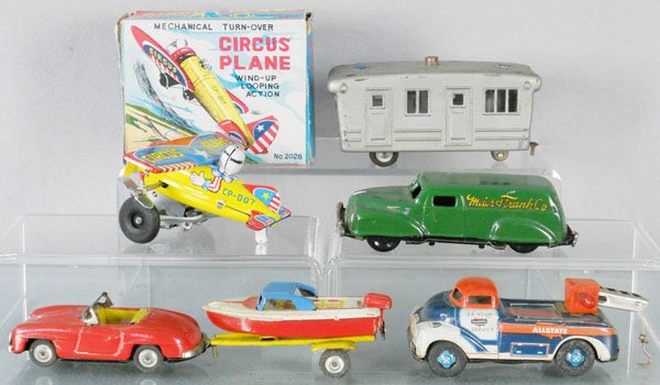 4 TIN VEHICLES: litho tin, litho tin, Circus Plane, windup working, orig box, Car w/2 Trailers, Wrecker, Delivery Truck, 3 1/2” to 4 1/2” long, C5-7.