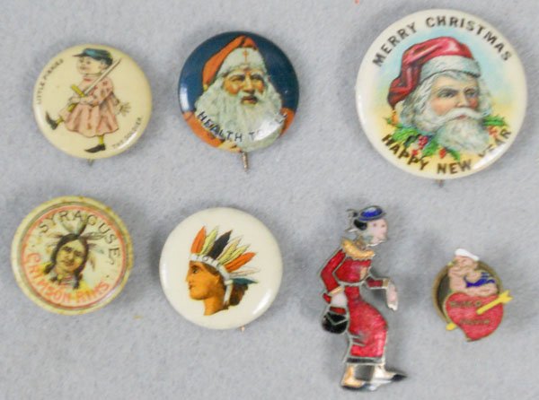7 NOVELTY PINS: Pepsin Gum Little Pinky’s The Soldier, Red Cross Santa, Merry Christmas Santa, Syracuse Crimson Rims Bicycle, Tote Indian, Popeye & Olive Oyl Busco Novia enamel pins, C5-8.