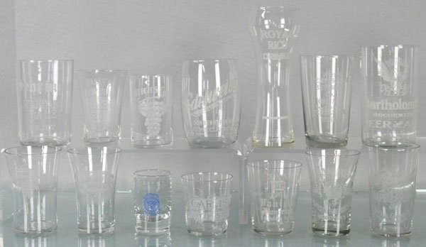 14 ETCHED ADVERTISING GLASSES: 2” to 5 1/2” tall, Royal Rich Drinks, Bartholomay Beer, Sehring Beer, Royal Grape Juice, Indian Head Juice, Adelweiss Beer, Millen’s Grape Juice, Yans Vanilla, Kelloggs Grape Juice, Carlisle Whi