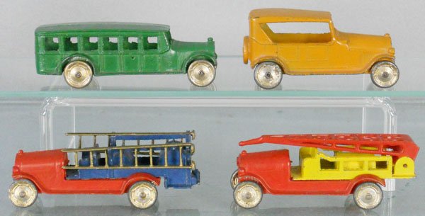 4 TOOTSIETOY VEHICLES: 4651 Safety Coach, 4641 Touring Car, 4652 Hook & Ladder, 4653 Water Cannon, C6-7.
