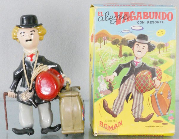 ROMAN OF SPAIN CHARLIE CHAPLIN: plastic, windup working, 6 1/2” tall, orig box minor wear, C7-8.