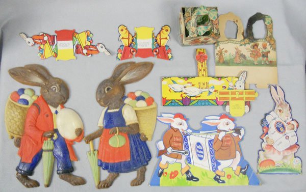 EASTER DECORATIONS: cardboard, includes 2 Swift's Premium Ads Stand Ups, 6 Egg Baskets, 2 pressed cardboard Wall Art pieces, 1 w/small repair, largest is 14 1/2" tall, C6-8.
