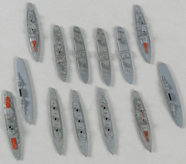 13 TOOTSIETOY SHIPS: 1034 Battleship, 1038 Freighter, 3 #1039 Tankers, 3 #1035 Cruisers, 2 #1036 Carriers, 3 #1037 Transports, 7 ships have broken masts, none have been fitted with wheels, C8.