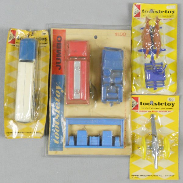 4 TOOTSIETOY CARDED SETS: 3-piece Gas Station Set, Greyhound Bus, Caisson, Cannon, factory sealed on orig cards, cards have minor wear, C10.