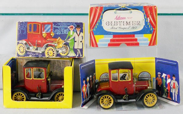 2 SCHUCO 1227 OLD TIMER CARS: litho tin, 1917 Ford Coupe T, windups working, w/keys, orig boxes, 1 worn, 1 rough, C8-9.
