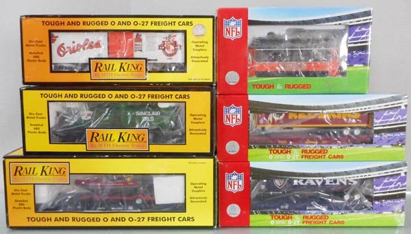 6 MTH RAIL KING CARS: O ga, 30-74410 Baltimore Orioles box car, 30-76249 New Haven flat w/rescue boat, 30-7311 Sinclair tanker, 30-76240 Washington Redskins flat w/trailer, 30-76241 Baltimore Ravens flat w/trailer, 30-4164
