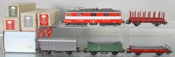 HAG FREIGHT TRAIN SET: HO ga, 3-rail, 210 Swiss Express loco, 345 box car w/house, gray, 330 hopper, green, 310 stake flat, 320 flat, orig boxes, 1 w/graffiti, C9-10.