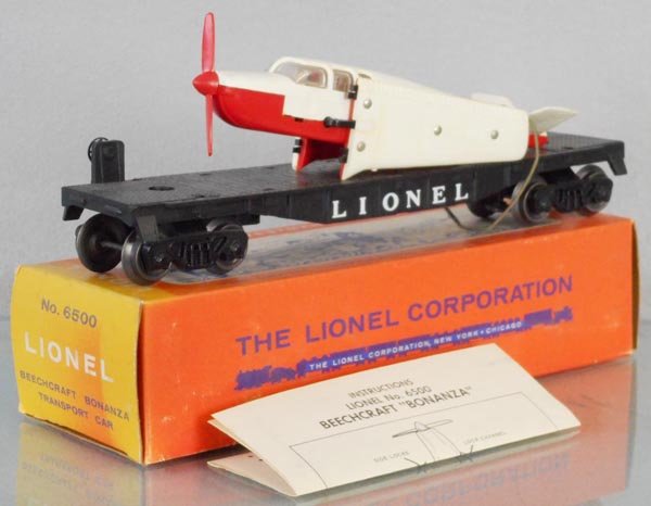 LIONEL 6500 BEECHCRAFT BONANZA TRANSPORT CAR: O ga, white over red plane, orig box minor wear, 1 end sunfaded, C8.