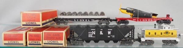 4 LIONEL FREIGHT CARS: O ga, 6262 wheel car, 6800 flat w/airplane, 6446-25 N&W hopper, 6657 Rio Grande caboose, orig boxes minor wear, C6-8.