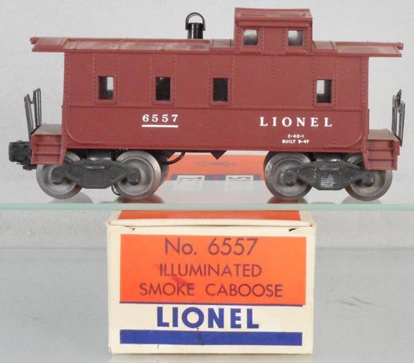 LIONEL 6557 SMOKING CABOOSE: O ga, w/bottle of smoke fluid, orig box, C8-9.