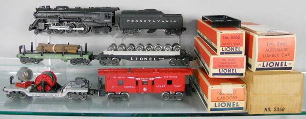 LIONEL TRAIN SET: O ga, 2056 loco, 2045W-50 tender, 3461 lumber car, 6262 wheel car, 3650 searchlight car w/crank, 6517 caboose, orig boxes, only 2 inserts, no tender box, C7-8.