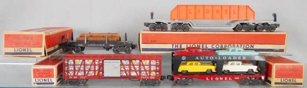 4 LIONEL FREIGHT CARS: O ga, 3461 log flat, 6418 girder flat, 6434 poultry dispatch, 6414 auto loader, orig boxes rough, C7.