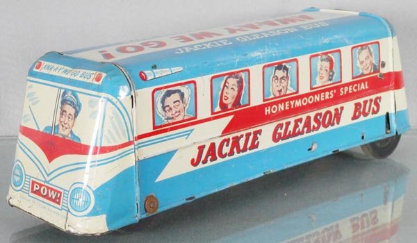 WOLVERINE JACKIE GLEASON BUS: litho tin, 14" long, friction working, some small dents & scratches, C6.