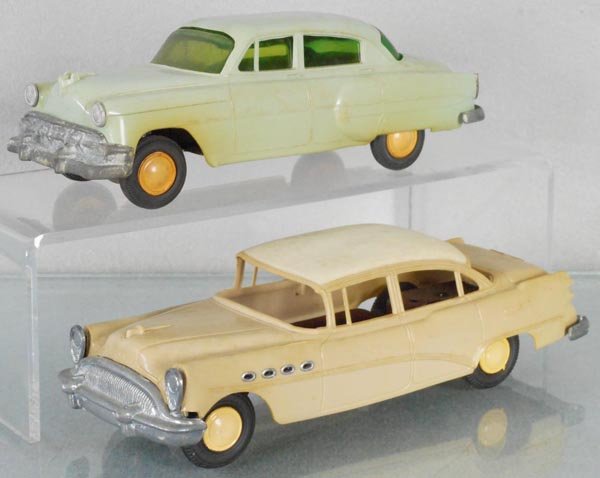 2 PROMO AUTOS: PMC 1953 Chevy Sedan, gray, AMT Buick Roadmaster Sedan, tan & cream, both are friction working, some oxidation on chassis & body warp, C5.