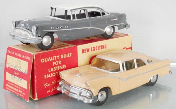 2 AMT PROMOS: 1954 Buick Roadmaster, gray & cream, friction working, oxidation on chassis, orig box minor wear, 1955 Ford Fairlane, tan, both have added silver embellishments & minor body warp, C6-7.