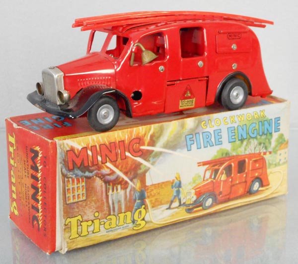 MINIC 62M FIRE ENGINE: windup working, rubber hose dried, 1 ladder reglued, orig box minor wear, C8.