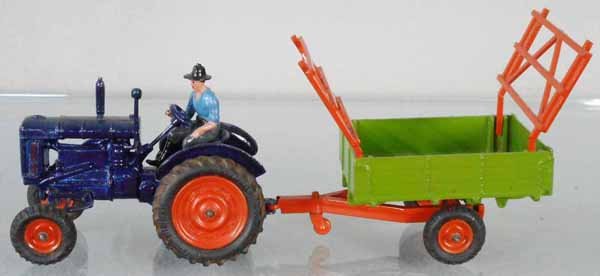 BRITAINS 128F FORDSON TRACTOR W/TIPPING CART: some decal wear, chips on 1 fender, C7.