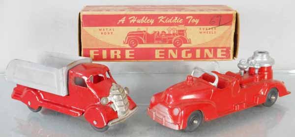 2 TOY TRUCKS: Hubley 464 Fire Engine, die cast, 7 1/4” long, orig box worn, Marx Dump Truck, painted pressed steel, wood tires, light tarnish on grille, scratches by side window, 6 1/2” long, C7-8.