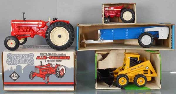 4 ERTL FARM VEHICLES: die cast, Allis-Chalmers D19, 405 Mini Tractor, 554 John Deere Skid-Steer Loader, 822 Spreader, orig boxes & inserts minor wear, C9.