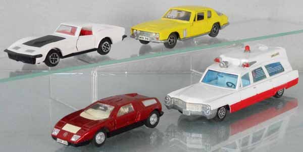 4 DINKY VEHICLES: 221 Corvette Stingray, 188 Jensen FF, 224 Mercedes Benz C111, 267 Superior Cadillac Ambulance, C8-9.