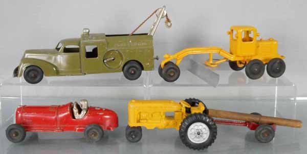 4 HUBLEY VEHICLES: die cast, 478 Ford Bell Telephone Truck & Trailer, 10 1/2” long, 481 Scraper, 9 1/2” long, 457 Racer, 7” long, 451 Tractor, 5 1/2” long, C5-8.
