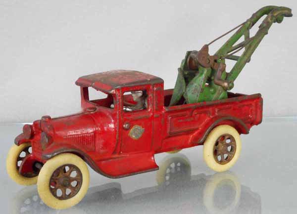 ARCADE FORD WRECKER: painted cast iron, 11” long, Weaver wrecker boom, reproduction driver, C4-5.