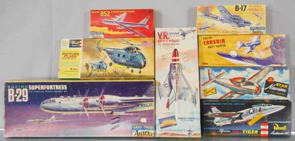 8 PLASTIC AIRPLANE MODEL KITS: O-Lin 512 Corsair, Lindberg 507-69 Navion, Revell H249-89 Tiger, H 181-98 Marine Helicopter, Aurora 491-49 B-17, 494-49 B52, 60-98 Convair, 372-2.59 B29 Superfortress, all unbuilt & appear complete, o