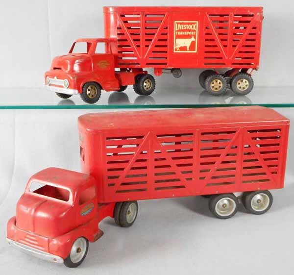 TONKA & DUNWELL LIVESTOCK TRUCKS: painted pressed steel, Dunwell, 23” long, missing 1 mud flap, Tonka, 22” long, missing trailerfront wheels, some surface oxidation spots, both rear doors intact, C5.