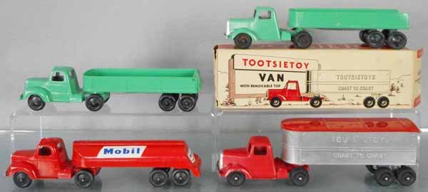 4 TOOTSIETOY MACK TRUCKS: Dump, Machinery Hauler, Tanker & 589 Van, orig box minor wear, C8.