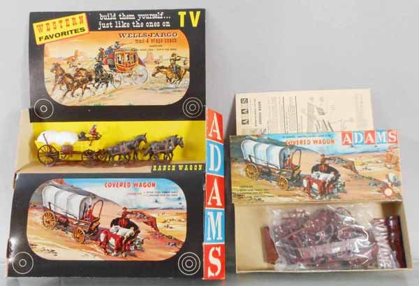 ADAMS RANCH WAGON STORE DISPLAY & COVERED WAGON KIT: cardboard display containing built plastic Ranch Wagon model, display is 16” tall, w/K-231-88 Covered Wagon Kit, unbuilt, orig box, C8-9.