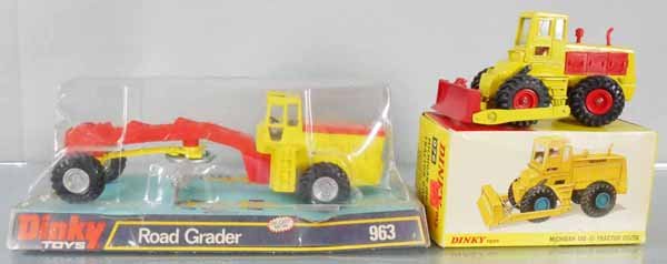 2 DINKY CONSTRUCTION VEHICLES: 976 Michigan Tractor Dozer, some chips where cab comes on & off, orig box minor wear, C7-8, 963 Road Grader, orig box some wear, C8-9.