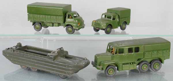 4 DINKY MILITARY VEHICLES: 621 3-ton Army Wagon, 641 1-ton Army Cargo Truck, driver loose & broken inside cab, 825 DUKW, 689 Medium Artillery Tractor, C5-7.