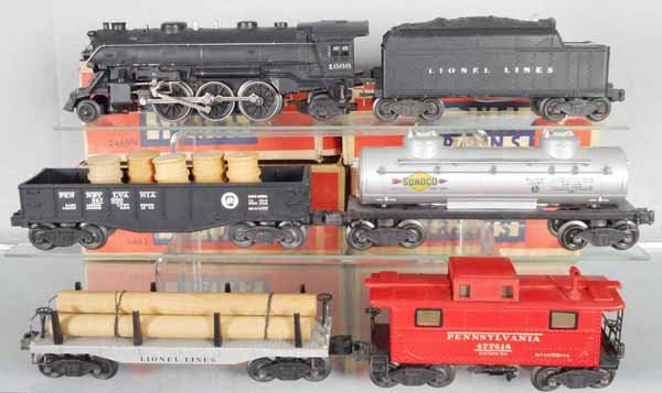 LIONEL 3105W TRAIN SET: O ga, ca 1948, 1666 loco, rubberstamped, 2466WX tender, 2452X gondola w/barrels, 2465 tank, doublestamped, 2411 log car, 2457 caboose w/flying shoe trucks, 4 orig boxes only, boxes rough, C6-7.